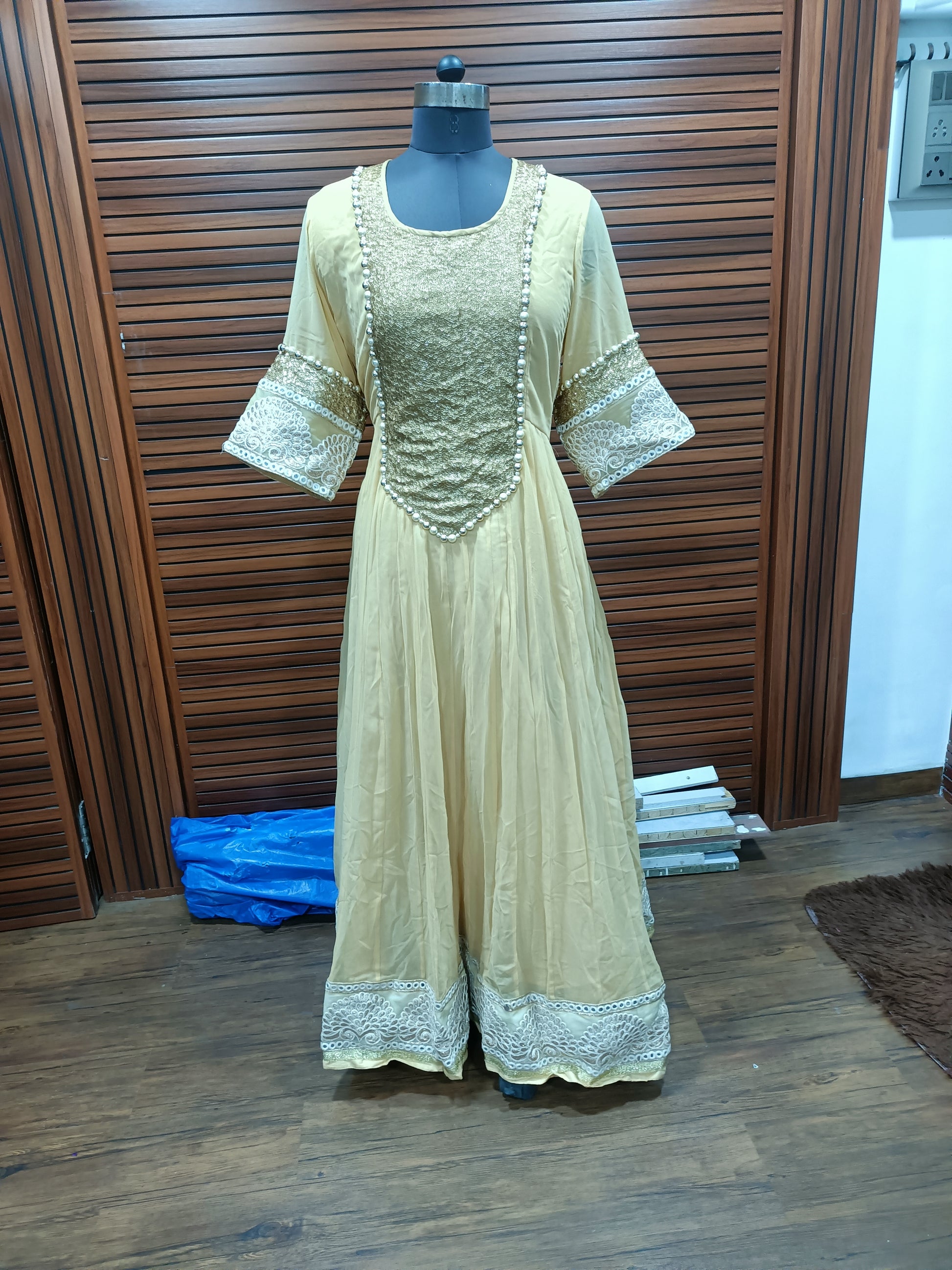 Elegant Golden Anarkali Dress with Embroidery & Pearl Detailing